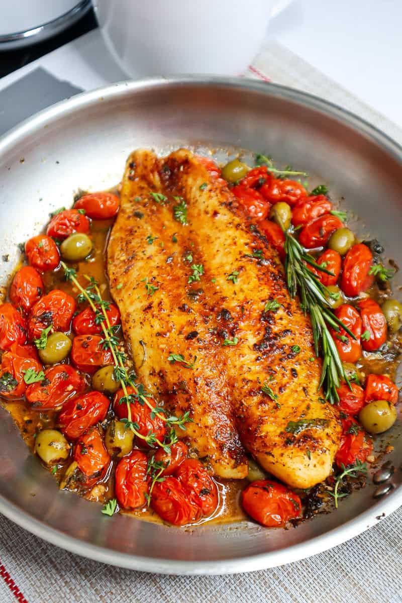 Mediterranean Baked Fish with Seared Basa, Tomatoes, and Olives