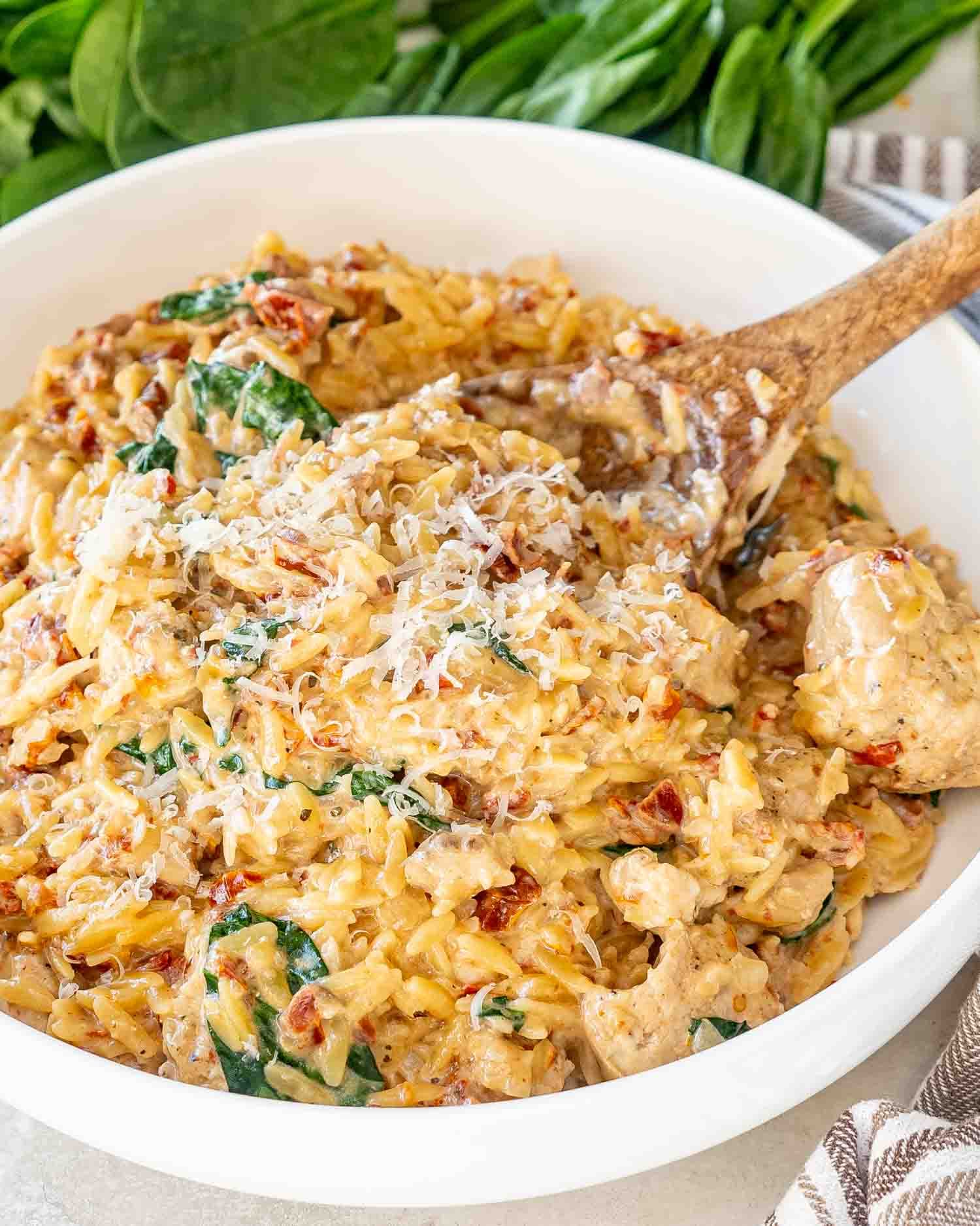 Slow Cooker Creamy Tuscan Chicken Orzo with Sun-Dried Tomatoes and Parmesan