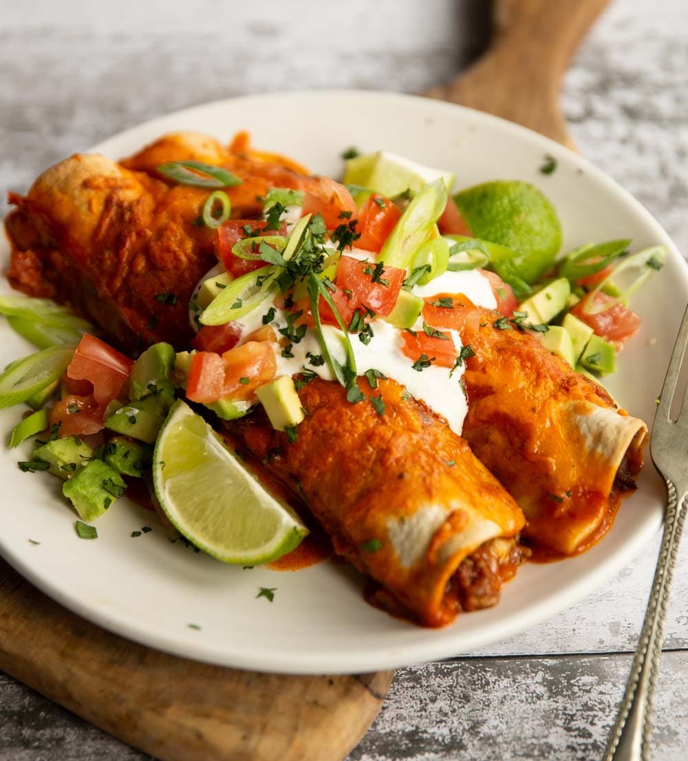 Ground Beef Enchiladas with Homemade Red Sauce and Golden Cheese