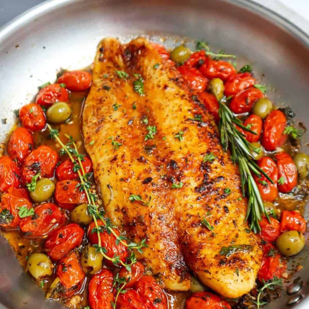 Mediterranean Baked Fish with Seared Basa, Tomatoes, and Olives