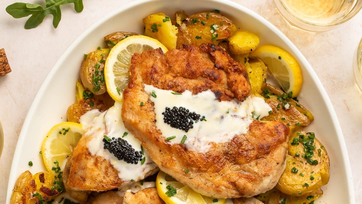 Crispy Chicken with Lemony Crème, Caviar, and Chive Butter Potatoes