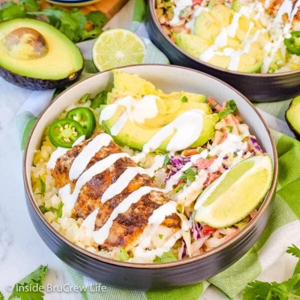 Low Carb Fish Taco Bowls with Baked Cod and Honey Lime Crema
